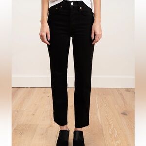 Re/Done high rise stovepipe raw hem jeans in jet black Size 28